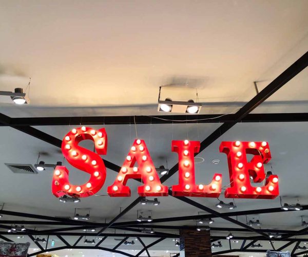 big-red-sale-sign-with-light-bulbs-decoration-i-2023-11-27-05-15-23-utc
